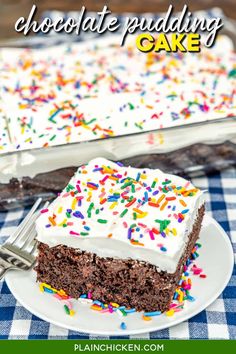 chocolate puddinging cake with white frosting and sprinkles on a plate