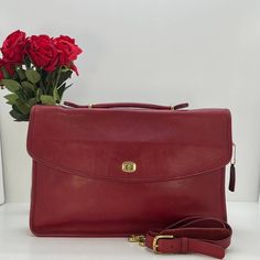 Vintage Coach #5265 Lexington Briefcase in Red Leather Made in China in 2002 Includes hangtag Condition- some mild normal wear throughout, please see photos. There's also a faint  mark on front of bag, a scratch on the back that appears to be natural to the leather, and an ink stain on the interior of the bag (doesn't show on the outside of the bag), please see close up photos.  Please see photos for approximate measurements.  Shop with confidence- each purchase is securely packaged and promptly shipped (usually within 1-2 business days).  Please note: we add USPS signature confirmation upon delivery for orders over $300.  Thank you for shopping with us! Work Bags Laptop, Vintage Coach Bags, Ink Stain, Stacked Jewelry, Be Natural, Work Bag, Coach Bag, Vintage Coach, Made In China