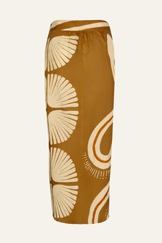 Styling Notes: Make a statement in this midi skirt adorned with bold prints inspired by the Amazon. Its wrap-around design makes it perfect for pairing with a simple blouse or bikini top, offering versatility for various occasions. Size and Fit:Designed for a slim fit. True to size, please consult our size chart for reference. Product Details:Closure: Wrap AroundComposition: 100% LinenFabrication: Printed LinenColor: Mother Boa Pareo Camel/EcruHand WashMade in ColombiaShipping and Return Policie Chic Printed Summer Skirt, Chic Long Printed Skirt, Chic Summer Bottoms With Bold Print, Chic Relaxed Printed Skirt, Chic Pencil Skirt For Vacation, Chic Summer Pencil Wrap Skirt, Chic Vacation Pencil Skirt, Chic Relaxed Wrap Skirt For Vacation, Chic Spring Sarong