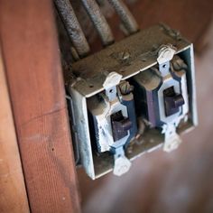 an electrical box with two wires attached to it