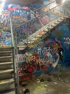 the stairs are covered with graffiti and spray paint