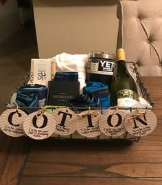 a basket filled with lots of different items on top of a wooden table