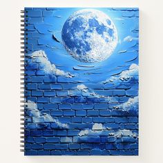 a blue brick wall with the moon in the sky and clouds on it spiral notebook