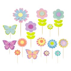 a bunch of flowers and butterflies on sticks