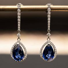 2.10 Ct Pear & Round Cut Blue Sapphire Diamond Drop Dangle Earrings 14K White Gold Finish  THIS PENDANT IS READY TO MADE A ORDER  ✔ Type : Earring  ✔ Style : Drop & Dangle  ✔ Main Stone : Sapphire & Diamond  ✔ Main Stone Color : Blue & White ✔ Main Stone Shape : Pear & Round         ✔ Metal Purity : 925 Sterling Silver ✔ Main Stone Creation : Simulated ✔ Total Carat Weight : 2.10 Ct  ✔ Metal Finish  : 14k White Gold Finish  ✔ Ready to Ship in 3-5 Business Days ♥ Custom Birthstone Ring ♥  The mos Blue Briolette Earrings For Formal Occasions, Formal Blue Pear-shaped Diamond Earrings, Formal Sapphire Dangle Diamond Earrings, Blue Teardrop Diamond Earrings, Blue Gemstone Teardrop Earrings For Formal Events, Blue Pear-shaped Diamond Earrings For Anniversary, Wedding Sapphire Drop Diamond Earrings, Luxury Blue Teardrop Earrings, Formal Teardrop Sapphire Earrings