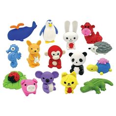 many different toy animals are shown together