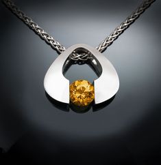 "Citrine Necklace, Argentium Silver - 3423 - Argentium Chain Included. Ready to ship! ( IMPORTANT - PLEASE READ 1. AND 2 BELOW ) 1.) Included in the price is an Argentium silver chain appropriate for the pendant chosen. You can choose from 16\", 18\" or 20\" length at checkout. 2.) PLEASE LOOK AT THE MEASUREMENTS CAREFULLY. Some photos have been enlarged to show detail, while others have been minimized to fit the frame. Actual size cannot be determined from the photographs. MEASUREMENTS AND MATE Yucca Valley, Garnet Red, Citrine Pendant, Citrine Necklace, Yellow Gemstones, Topaz Necklace, Garnet Pendant, Garnet Necklace, Red Necklace