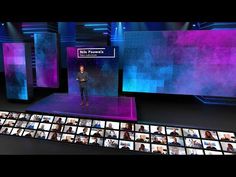 a man standing on top of a stage surrounded by purple and blue lights in front of large screens