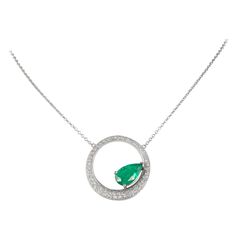 Beautiful modern emerald and diamond pendant 1 pear shape emerald, 2.99 carats, apx F2. Complimented by round brilliant diamonds, 0.78 carats. Approximately G/H color and SI clarity. 18k white gold, 8.45 grams, 16in. 3.77 carats total gemstone weight. Accommodated with an up to date digital appraisal by a GIA G.G., once purchased, upon request. Please contact us with any questions. Thank you. Item Number N6571 White Gold Pendant Necklace, Pearl Drop Necklace, Emerald Necklace, Modern Necklaces, Drop Necklace, Brilliant Diamond, Gold Pendant Necklace, G H, Pave Diamonds