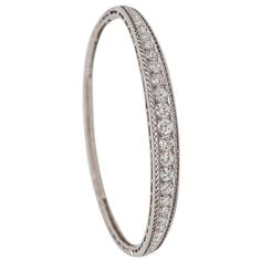 Check out this item from 1stdibs! Marcus & Co. 1910 Edwardian Bangle Bracelet In Platinum With 3.16 Ctw In Diamond: https://www.1stdibs.com/id-j_22599242 Edwardian Bracelet, Iconic Jewelry, Simple Wedding Bands, Edwardian Ring, Edwardian Jewelry, Filigree Pattern, Elegant Bracelet, Natural Earth, Jewelry Maker