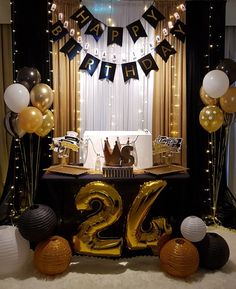 a birthday party with balloons and decorations