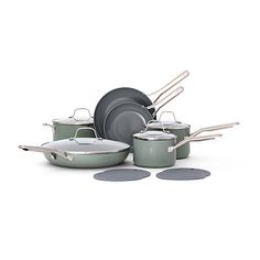 an assortment of pots and pans on a white background with no one around them