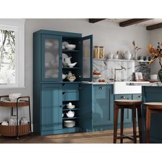 a kitchen with blue cabinets and marble counter tops