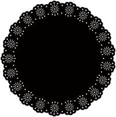 a black doily with white dots on the edges and an oval design in the center