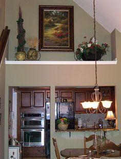 the kitchen is clean and ready to be used as a dining room or living room