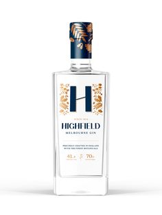 a bottle of alcohol that is next to a white background with the words highfield on it