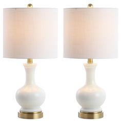 pair of white ceramic lamps with gold accents