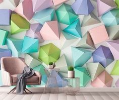 a room with a chair, vase and wallpaper that looks like origami