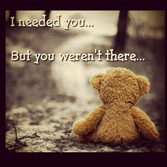 a brown teddy bear sitting on top of a dirt ground next to a forest with the words i need you but you weren't there