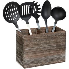 five black kitchen utensils in a wooden holder