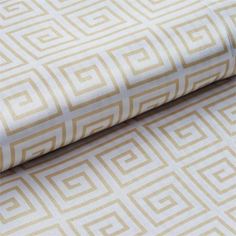 a close up view of a wallpaper with white and beige geometric designs on it