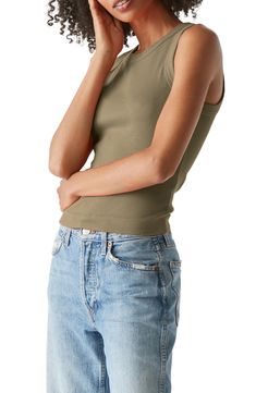 Love to layer in this finely ribbed tank made from a stretchy cotton-modal blend. 21" length (size Small) Crewneck 48% cotton, 48% modal, 4% spandex Machine wash, tumble dry Made in the USA Trendy Ribbed Cotton Camisole, Cotton Top With Seamless Construction For Spring, Ribbed Cotton Camisole For Spring, Stretch Ribbed Top Made Of Modal, Seamless Cotton Top For Spring, Everyday Fitted Ribbed Tank Top, Stretch Ribbed Tank Top For Layering, Spring Ribbed Cami Tank Top, Ribbed Cotton Stretch Camisole