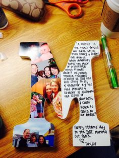 a wooden table topped with photos and magnets