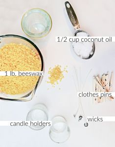 ingredients to make an ice cream recipe on a white table with measuring cups and spoons