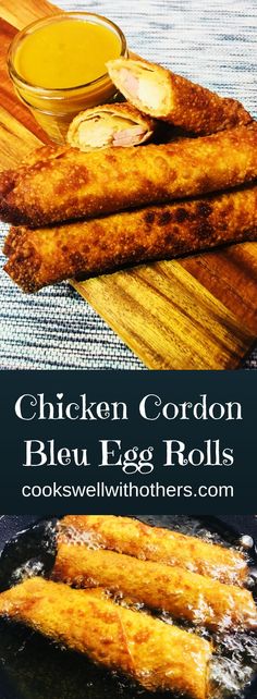 chicken cordon bleu egg rolls on a plate with dipping sauce