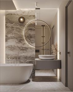 a modern bathroom with marble walls and flooring, round mirror above the bathtub