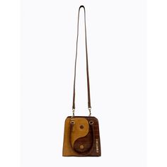 Mini handbag in limited edition appliqued Yin Yang pattern, cut out in chocolate brown & tan faux croc leather. Bag surprisingly roomy given its petite appearance. Can fit wallet, iPhone or Android phone easily plus keys and some cosmetics.Comes with detachable long strap, gold hardware throughout. Lined in R-PET fabric made from post-consumer recycled plastic bottles which would have otherwise been destined for landfill.Bag height: 17cm width: 16cmSmall strap drop: 12cmLong detachable strap dro Rectangular Brown Phone Bag For Everyday Use, Brown Square Phone Bag For Daily Use, Casual Brown Rectangular Phone Bag For Daily Use, Brown Rectangular Phone Bag For Everyday, Everyday Brown Rectangular Phone Bag, Everyday Brown Handheld Phone Bag, Trendy Brown Rectangular Phone Bag, Brown Leather Rectangular Phone Bag, Trendy Handheld Brown Phone Bag