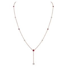 HANDMADE RUBY DIAMOND Y NECKLACE PENDANT; Adjustable 15 to 20 inches chain Designed and crafted with your comfort in mind, this cute and delicate White Diamond & Red Ruby Necklace it is domed in the interior which makes it a sure comfortable wear experience. Number of Stones: 10 Length of Necklace Chain: Adjustable 15 to 20 inches Sapphire Cut: Ideal cut Color: Red & White Clarity: VS2-SI1 Diamond Color: G-H Clasp: Lobster-Clasp Setting: Bezel Set Enjoy 30 days money back guarantee. Dazzling Ruby Necklace With Diamond Cut, Ruby Necklace With Brilliant Cut, Red Ruby Necklace With Diamond Accents, Luxury Ruby Necklace With Diamond Cut, Red Diamond-cut Necklace In Fine Jewelry Style, Ruby Necklace, Ruby Diamond, 18k Rose Gold, Cut And Color