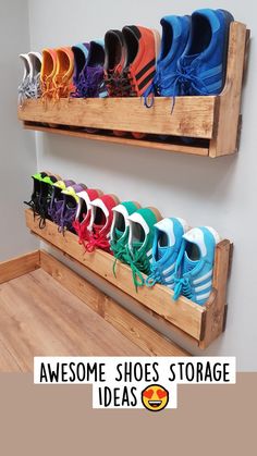 there are many pairs of shoes hanging on the wall