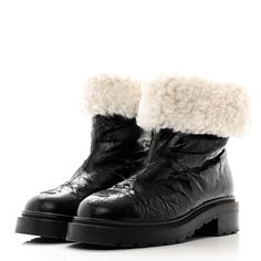 This is an authentic pair of CHANEL Lambskin Shearling Short Boots size 39.5 in Black. These stylish, boots are crafted of lambskin leather with a wool interior and a 1.5-inch rubberized heel. Stylish Boots, Chanel Shoes, Short Boots, Lambskin Leather, Chanel, Thing 1, Wool, Boots, Heels