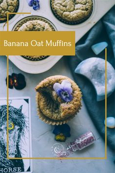 banana oat muffins on a table with blue flowers