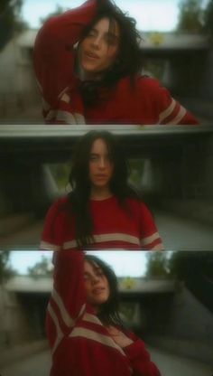 a woman with long hair and wearing a red shirt