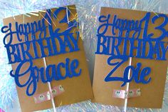 two brown birthday cards sitting on top of each other with blue writing that says happy birthday grace