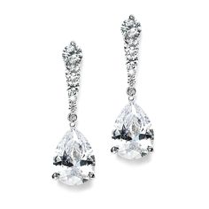 pair of earrings with pear shaped diamonds on white background