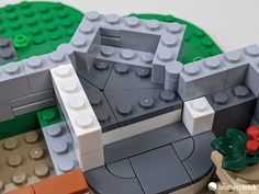 a close up of a lego house made out of bricks