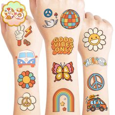 several temporary tattoos on the arms of someone's arm with different designs and colors