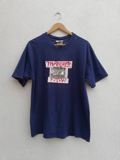 "Please read all description carefully before buying. If you have any questions feel free to ask. Vintage 90's Thrasher FTW Christian Hosoi T-shirt Colour : Blue Size on tag : L Brand : Thrasher Condition : Good vintage condition. Soft faded color MEASUREMENT Armpit to armpit : 21\" Shoulder to bottom hem : 29\" PLEASE CHECK ACTUAL SIZE CAREFULLY, NO RETURNS OR COMPLAINT FOR WRONG SIZE ACTUAL. ACCEPT PAYPAL ONLY. Shipping cost is $18 for economy or $28 DHL Express wordwide shipping. Transit time Christian Hosoi, Skateboard Tshirt, Hip Hop Shirts, Shirt Colour, Hardcore Punk, Tour T Shirts, Dhl Express, Skateboarding, Skateboard