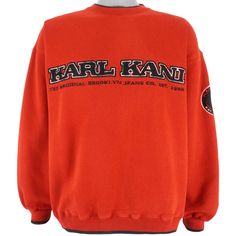 1990s Vintage Karl Kani Embroidered Crew Neck Sweatshirt. Red in color with big logo and spell-out, fits large size and is in excellent condition. https://vintageclubclothing.com//collections/all/products/karl-kani-red-embroidered-crew-neck-sweatshirt-1990s-large For measurements, product detail and high resolution photos, please check out this vintage gem on our website at the above link. If you have any questions please message us on Instagram @thevintageclubclothing or here on Etsy. Red College Sweatshirt With Embroidered Logo, Red Sweatshirt With Embroidered Graphics For Streetwear, Retro Embroidered Logo Sweatshirt For Streetwear, Throwback Red Sweatshirt For Streetwear, Red Crew Neck Sweater For Streetwear, Sporty Red Sweatshirt With Embroidered Logo, Red Sporty Sweatshirt With Embroidered Logo, Red Throwback Sweatshirt For Streetwear, Red Embroidered Sweatshirt For Streetwear