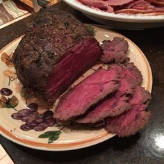 the meat is sliced and ready to be served on the plate, along with other meats