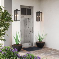 a white door with two black planters next to it and the words, your perfect outdoor lighting