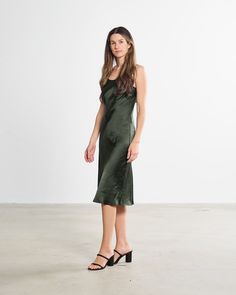 We think you might like this... A sultry slip dress that softly drapes in a flattering silhouette. With so many ways to wear, this versatile show stopper from the Harbour Thread Exclusive Label will look stunning paired with your favorite heels, just as it will with a sweater and sneakers for a casual daytime look. There are endless style options this classic and durable dress can provide throughout the seasons, making it a true closet staple. Go ahead, adorn with abandon. Features: Women's midi Spring Date Night Modal Satin Dress, Spring Modal Satin Dress For Date Night, Chic Summer Slip Dress With Smoothing Details, Spring Modal Satin Dress For Night Out, Chic Sleeveless Slip Dress With Smoothing Feature, Chic Sleeveless Smoothing Slip Dress, Chic Sleeveless Slip Dress With Smoothing Details, Chic Sleeveless Slip Dress With Smoothing, Fitted Dressy Slip Dress For Night Out