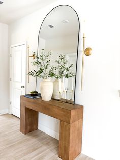 Elevate your entryway with this modern rustic console table. This is 100% handcrafted from high-quality reclaimed wood. Made in our family garage. These tables can be customize to fit any size or style preferences. Whether you're looking for a traditional or modern look, our rustic but modern tables will add character and charm to your space.  Standard size (the one pictured): 55 x 14 x 32 It comes disassembled in three pieces but assembly process is very easy. Assembly instructions will be prov Entryway Table Apartment, Organic Modern Entryway, Modern Rustic Console Table, Rustic Modern Home, Modern Entryway Decor, Rustic Console Table, Console Table Entryway, Rustic Console, Modern Tables