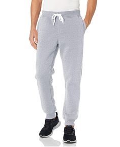 PRICES MAY VARY. 100% Polyester Imported Pull On closure Machine Wash STYLE - This is a relaxed basic fit leg fit Jogger pants. There are extra big pockets available each side of legs. It is inspired by cargo pants. MADE FOR COMFORT - Our fleece sweatpants for men feature a waistband with enclosed elastic, a draw cord, and side pockets for easy storage of all your essentials. EXCEPTIONALLY SOFT & RELIABLE DESIGN - Our fleece sweatpants are made of a polyester that stays comfortable over time, wh Khaki Joggers, Sweatpants For Men, Mens Jogger Pants, Basic Fit, Big Pockets, Fitted Joggers, Basic Fits, Fleece Sweatpants, Grey Joggers