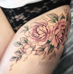 a woman's thigh with flowers on it