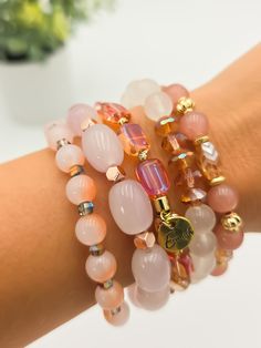 The Coco Rum Stack is a stunning and eye-catching bracelet stack that adds a subtle touch to any outfit. Its simple yet unique design will make you stand out in a playful and fun way. Lead & Nickel Free Bracelets are 'one size fits most' and are designed to fit wrists up to 7.5" comfortably. Please be aware that due to the unique and handmade nature of each product, colors, shapes, and bead sizes may vary slightly from the photos and descriptions. Trendy Stackable Jewelry For Friendship, Trendy Stackable Crystal Bracelet, Stackable Wrap Bracelet For Friendship, Trendy Rose Gold Bracelets For Everyday, Trendy Resizable Pink Bracelets, Pink Stackable Bracelets For Everyday, Trendy Stackable Beaded Bracelets, Trendy Stackable Bracelets As Gift, Trendy Stackable Wrap Bracelet With Round Beads