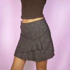 The Y2K Brown Layered Mini Skirt is a vintage 2000s boho fairy grunge inspired stretchy dark brown tiered skirt with side zipper closure. Made in Italy. TAG SIZE S MEASUREMENTS Length 37cm - 14.57 inch Waist 70cm - 27.55 inch Hips 88cm - 34.65 inch Our model is 172 cm tall and usually wears size XS. Please be aware that some items may be slightly pinned on the model to demonstrate the correct fit. We ship worldwide from Spain and offer free shipping on all orders when you buy 3 items or more! ♥ 2000s Boho, Vintage Mini Skirt, Mini Rock, Layered Mini Skirt, Boho Fairy, Skirt Y2k, Fairy Grunge, Tier Skirt, Measurement Length